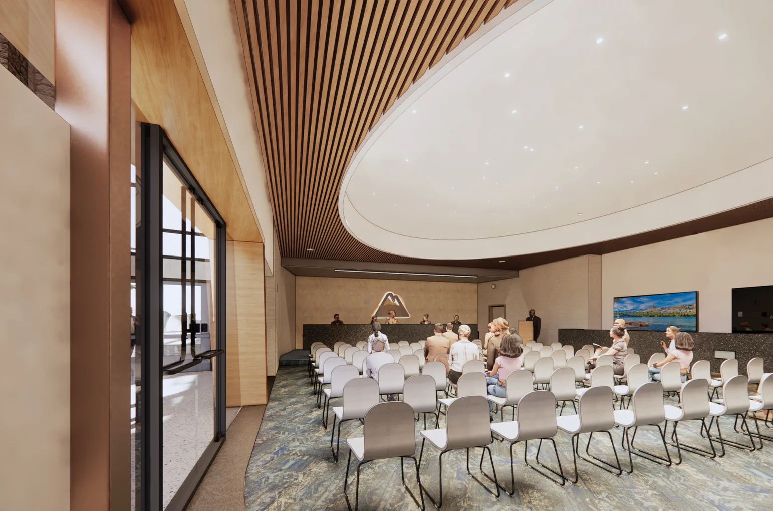 Design rendering of the council chamber: rows of chairs facing a raised dais with a mountain logo, under a timber-slat ceiling with a recessed oval soffit and soft downlights.
